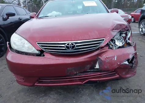 2005 Toyota Camry Le z USA, uszkodzony, nr VIN 4T1BE32K15U038472